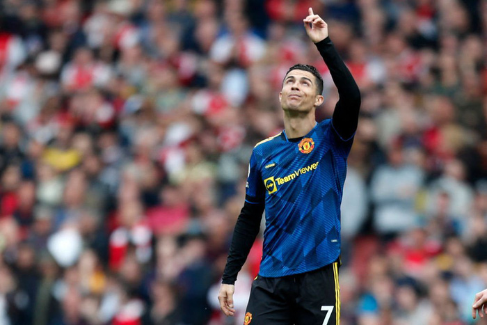 Ghi bàn vào lưới Arsenal, Ronaldo thiết lập kỷ lục ghi 100 bàn ở cả La Liga và Ngoại hạng Anh - Ảnh 1.