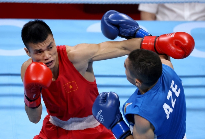 Ảnh: Nguyễn Văn Đương vượt qua đối thủ mạnh, giúp boxing Việt Nam có chiến thắng lịch sử sau 33 năm - Ảnh 3.