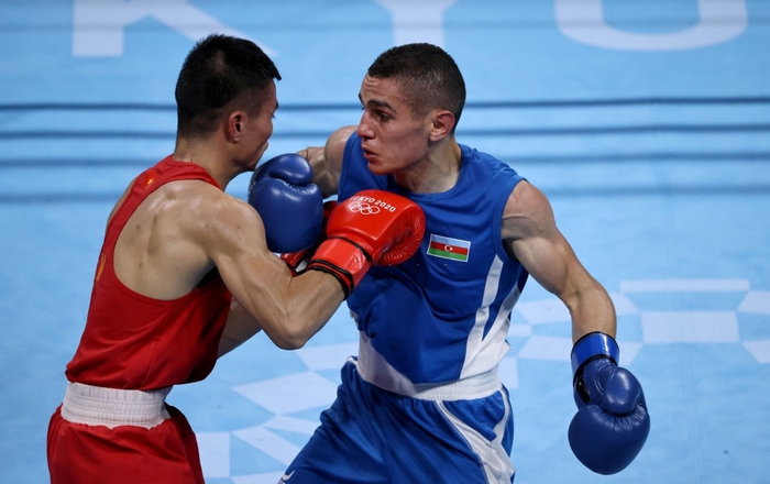 Ảnh: Nguyễn Văn Đương vượt qua đối thủ mạnh, giúp boxing Việt Nam có chiến thắng lịch sử sau 33 năm - Ảnh 2.