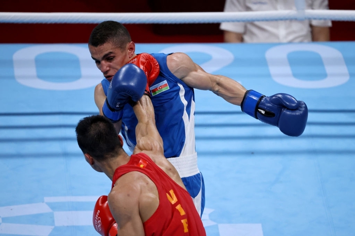 Ảnh: Nguyễn Văn Đương vượt qua đối thủ mạnh, giúp boxing Việt Nam có chiến thắng lịch sử sau 33 năm - Ảnh 5.