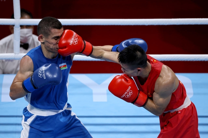 Ảnh: Nguyễn Văn Đương vượt qua đối thủ mạnh, giúp boxing Việt Nam có chiến thắng lịch sử sau 33 năm - Ảnh 6.