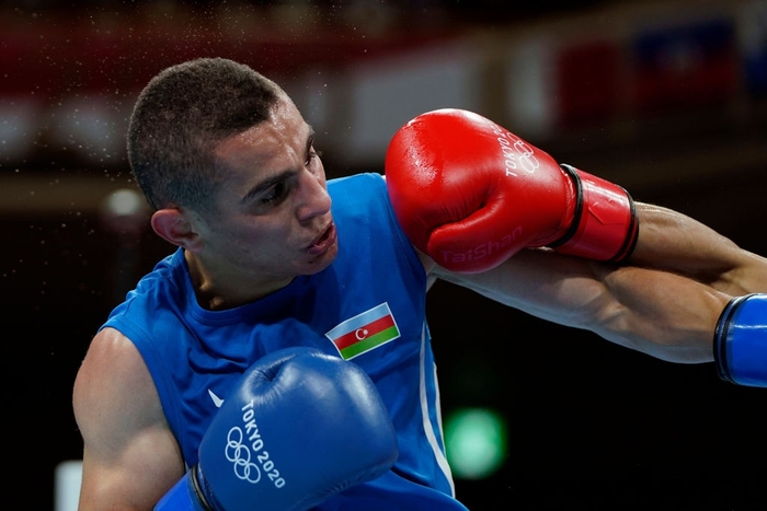Ảnh: Nguyễn Văn Đương vượt qua đối thủ mạnh, giúp boxing Việt Nam có chiến thắng lịch sử sau 33 năm - Ảnh 7.