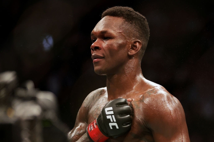 Israel Adesanya tiếp tục nối dài vương triều tại hạng trung, kéo theo cả danh tiếng lẫn tiền bạc - Ảnh 3.