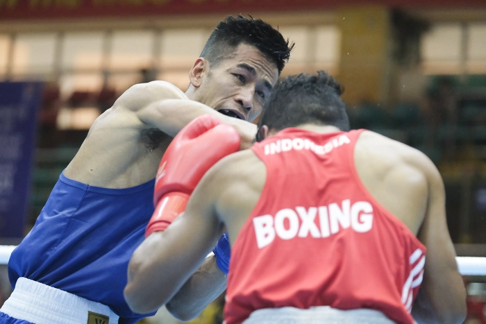 Trần Văn Thảo thi đấu thay phần đồng đội, mang về chiến thắng đầu cho tuyển boxing Việt Nam tại SEA Games 31 - Ảnh 4.